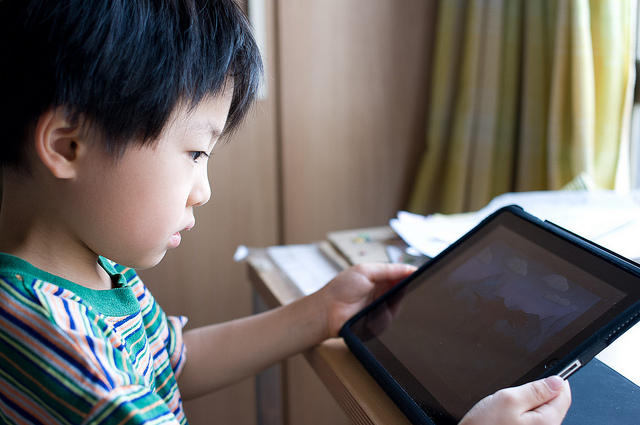 Child with iPad