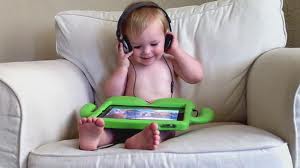 baby with ipad headphones
